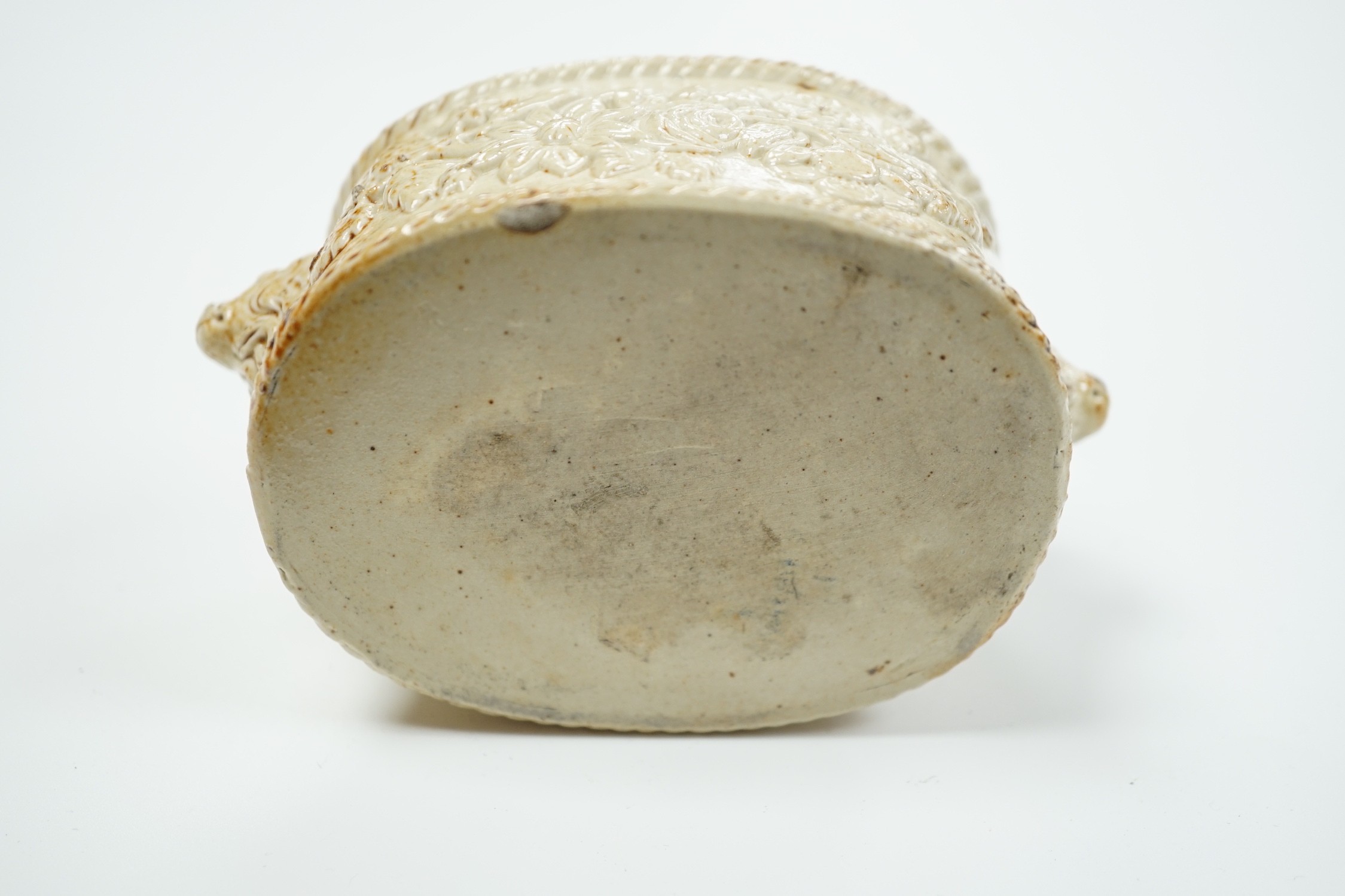 A mid 19th century saltglaze stoneware model of a foot bath, 12cm